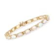 Opal and .25 ct. t.w. Diamond Bracelet in 14kt Yellow Gold