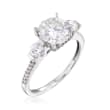 2.30 ct. t.w. Synthetic Moissanite Three-Stone Engagement Ring with .15 ct. t.w. Diamonds in 14kt White Gold