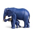 Lladro Blue and Gold Porcelain Elephant Figurine: Leading the Way