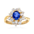 C. 1990 Vintage .90 Carat Sapphire and 1.04 ct. t.w. Diamond Ring in 18kt Yellow Gold