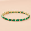 11.50 ct. t.w. Emerald and .45 ct. t.w. Diamond Tennis Bracelet in 18kt Yellow Gold