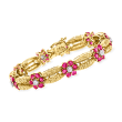 C. 1960 Vintage 9.00 ct. t.w. Ruby and 1.00 ct. t.w. Diamond Flower-Link Bracelet in 18kt Yellow Gold