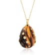 C. 1970 Vintage Tiger Eye and .50 ct. t.w. Diamond Fluted Pendant Necklace in 18kt Yellow Gold