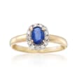 C. 1990 Vintage .45 Carat Sapphire and .20 ct. t.w. Diamond Halo Ring in 14kt Yellow Gold