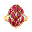 C. 1980 Vintage 3.50 ct. t.w. Ruby Cluster Ring with Diamond Accents in 14kt Yellow Gold