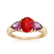 Fire Opal and 1.20 ct. t.w. Purple Rhodolite Ring in 14kt Yellow Gold 
