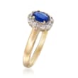 C. 1990 Vintage .45 Carat Sapphire and .20 ct. t.w. Diamond Halo Ring in 14kt Yellow Gold