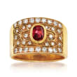 C. 1980 Vintage .50 Carat Ruby and .65 ct. t.w. Diamond Ring in 18kt Yellow Gold