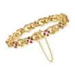 C. 1970 Vintage 3.00 ct. t.w. Ruby and 1.10 ct. t.w. Diamond Bracelet in 18kt Yellow Gold