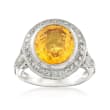 C. 1990 Vintage 5.65 Carat Oval Yellow Sapphire and .50 ct. t.w. Diamond Ring in Platinum