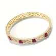 4.00 ct. t.w. Ruby and 1.00 ct. t.w. White Zircon Infinity Bangle Bracelet in 18kt Gold Over Sterling