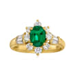 C. 1980 Vintage .95 Carat Emerald and 1.05 ct. t.w. Diamond Ring in 18kt Yellow Gold