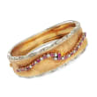 C. 1960 Vintage 1.05 ct. t.w. Ruby and .85 ct. t.w. Diamond Bangle Bracelet in 18kt Two-Tone Gold