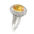 C. 1990 Vintage 5.65 Carat Oval Yellow Sapphire and .50 ct. t.w. Diamond Ring in Platinum