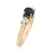 C. 1980 Vintage .75 Carat Sapphire and .40 ct. t.w. Diamond Three-Stone Ring in 14kt Yellow Gold