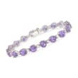 12.00 ct. t.w. Amethyst and 1.80 ct. t.w. White Topaz Tennis Bracelet in Sterling Silver