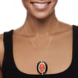 C. 1960 Vintage Red Coral Cameo Pendant Necklace with Black Onyx and .80 ct. t.w. Diamonds in 14kt Yellow Gold