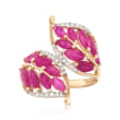 3.20 ct. t.w. Ruby and .17 ct. t.w. Diamond Leaf Bypass Ring in 14kt Yellow Gold