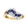 C. 1986 Vintage .75 ct. t.w. Sapphire and .60 ct. t.w. Diamond Wave Ring in 18kt Yellow Gold with British Hallmark