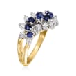 C. 1986 Vintage .75 ct. t.w. Sapphire and .60 ct. t.w. Diamond Wave Ring in 18kt Yellow Gold with British Hallmark