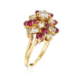 C. 1980 Vintage 1.30 ct. t.w. Diamond and 1.00 ct. t.w. Ruby Swirl Ring in 14kt Yellow Gold