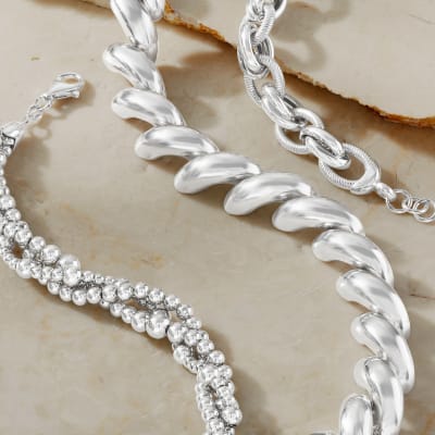 Italian Silver. Image Featuring Italian Sterling Silver U-Hoop Earrings. 874914, Italian Sterling Silver Big Bead Knot Ring 875257, Italian Sterling Silver Graduated Rope Chain Necklace 873338.