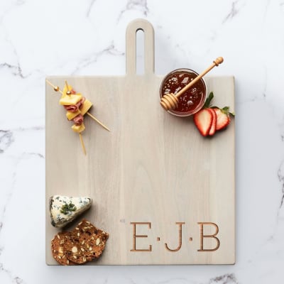 Personal Touch. Image featuring a Cutting Board With Enitials