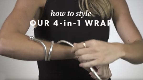 Four-in-one jewelry YouTube video. Model showing how to style.