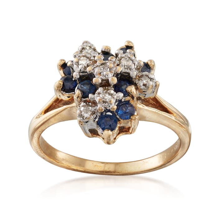 C. 1970 Vintage .50 ct. t.w. Sapphire and .10 ct. t.w. Diamond Cluster Ring in 14kt Yellow Gold