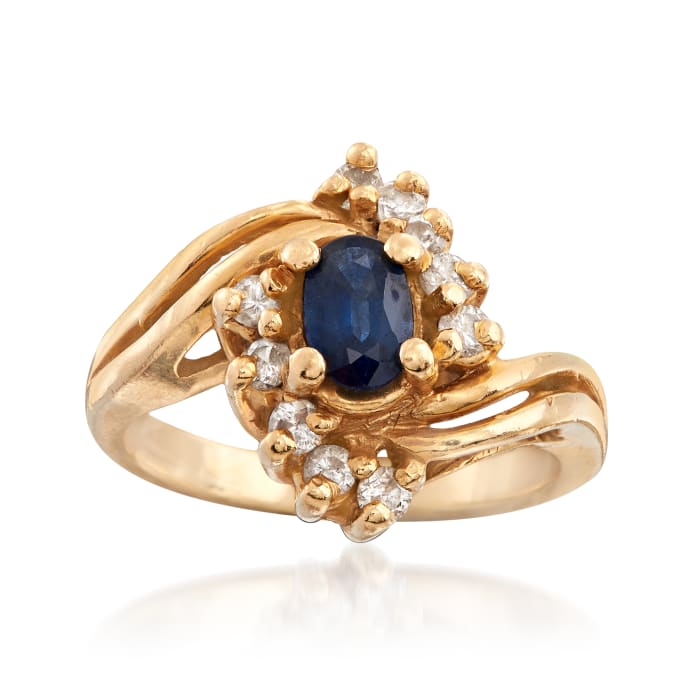 C. 1980 Vintage .45 Carat Sapphire and .25 ct. t.w. Diamond Ring in 14kt Yellow Gold