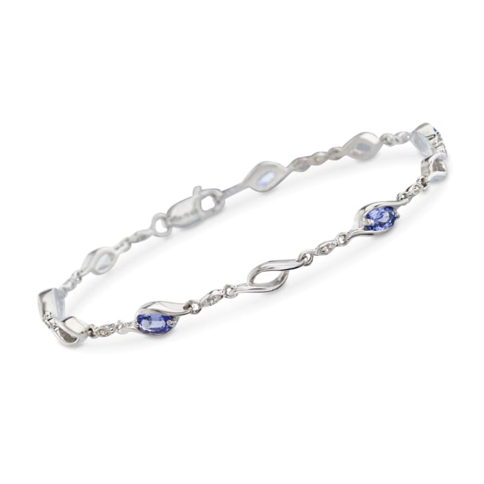 1.20 ct. t.w. Tanzanite Swirl Link Bracelet with White Topaz Accents in Sterling Silver