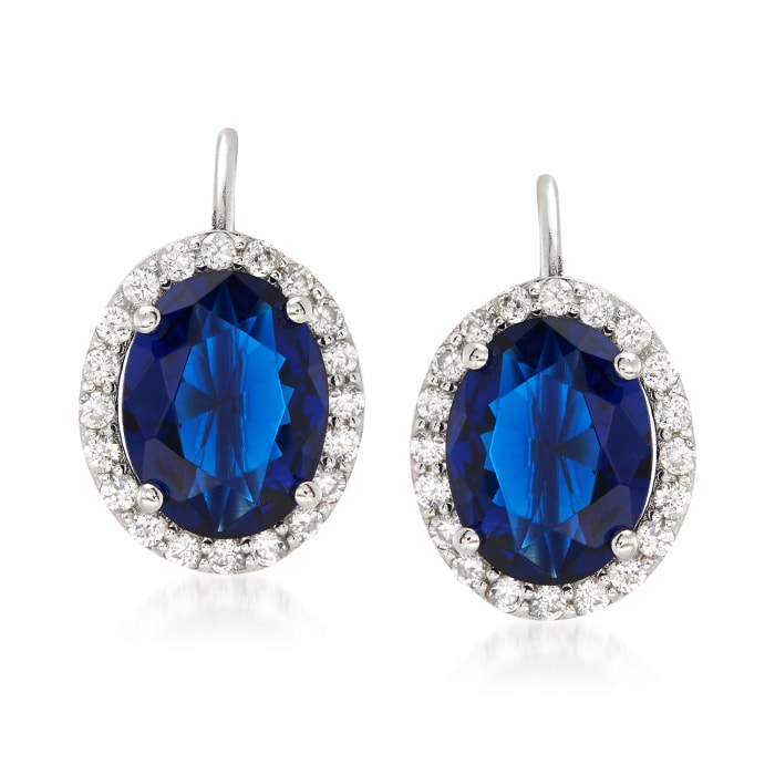 Oval Simulated Sapphire and .65 ct. t.w. CZ Halo Earrings in Sterling Silver
