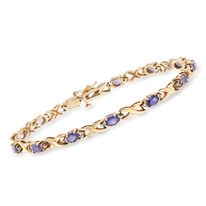 C. 1990 Vintage 1.95 ct. t.w. Iolite and .20 ct. t.w. Diamond Bracelet in 14kt Yellow Gold