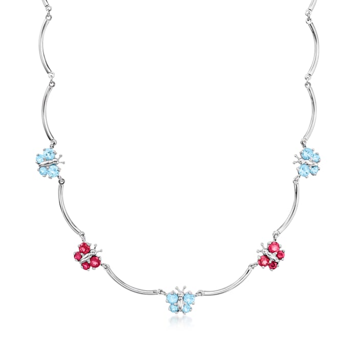 C. 2000 Vintage 2.10 ct. t.w. Sky Blue Topaz and 2.00 ct. t.w. Rhodolite Garnet Butterfly Station Necklace in 18kt White Gold